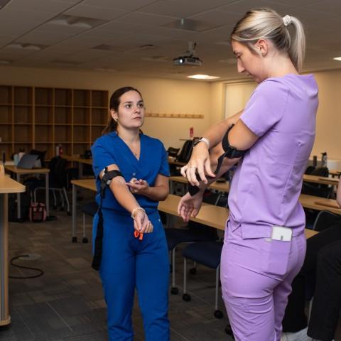 PA students try to place tourniquets on themselves